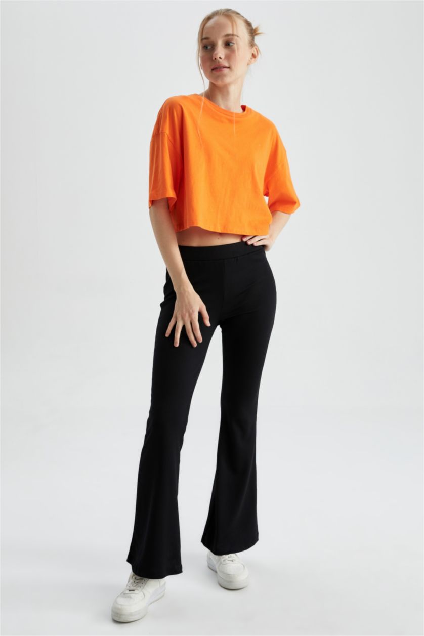 حريمي برتقالي تي شيرت قطن بأكمام قصيرة وقصة فضفاضة