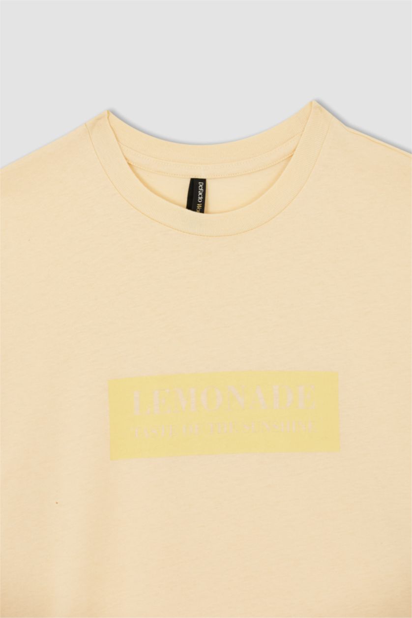 FEMME Jaune Clair Tunique t-shirt à manches courtes et Col rond à slogan imprimé Coupe régulière