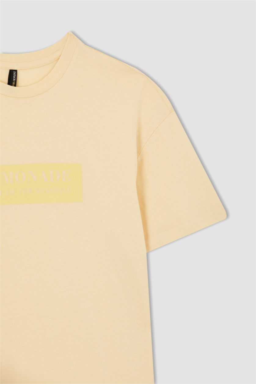 FEMME Jaune Clair Tunique t-shirt à manches courtes et Col rond à slogan imprimé Coupe régulière