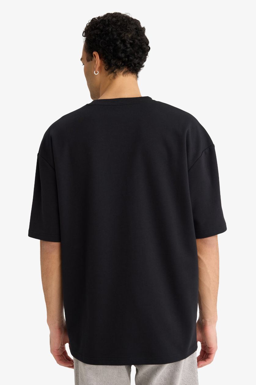 رجالي أسود تيشيرت نص كم اوفر سايز يسمح بمرور الهواء