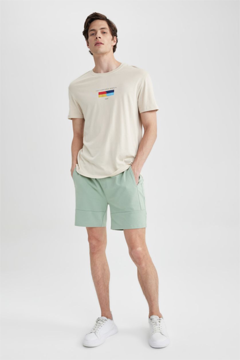 رجال أخضر فاتح شورت سليم فيت بساق ضيق