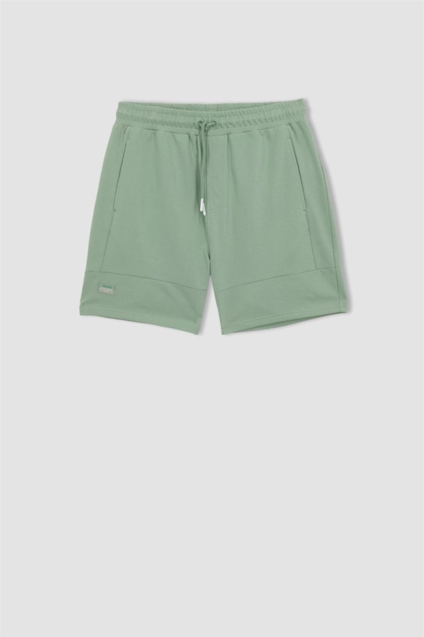 رجال أخضر فاتح شورت سليم فيت بساق ضيق