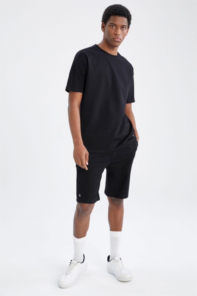 رجال أسود شورت كابري سليم فيت بساق ضيق