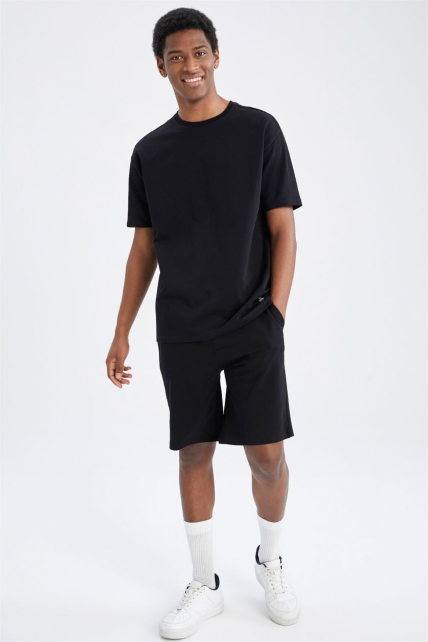 رجال أسود شورت كابري سليم فيت بساق ضيق