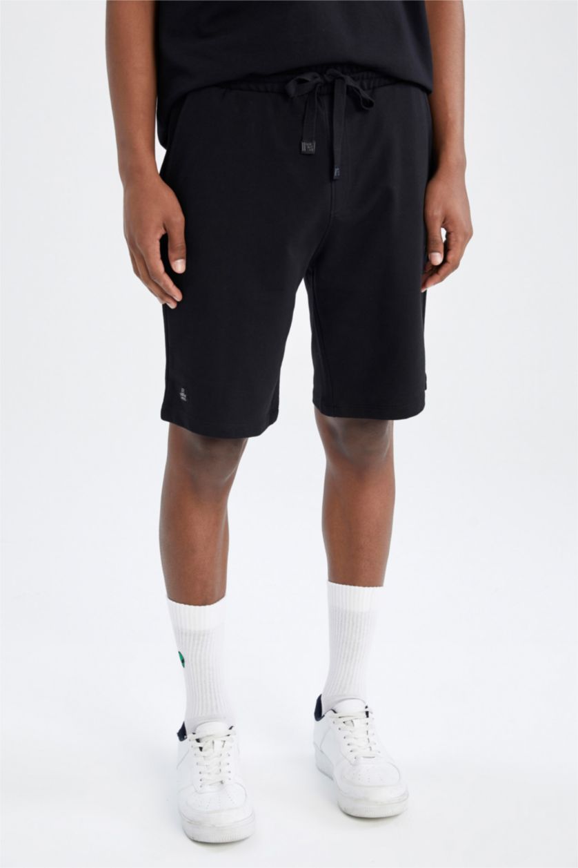 رجال أسود شورت كابري سليم فيت بساق ضيق