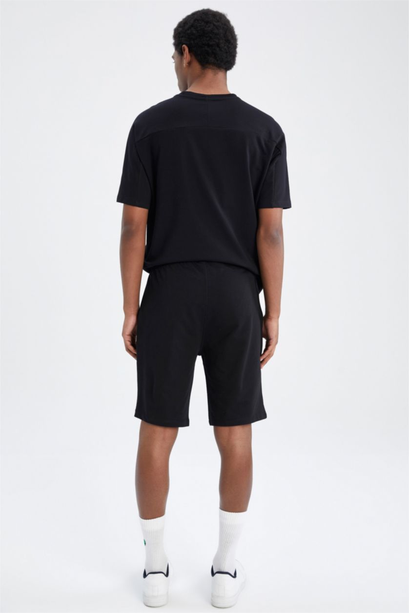 رجال أسود شورت كابري سليم فيت بساق ضيق