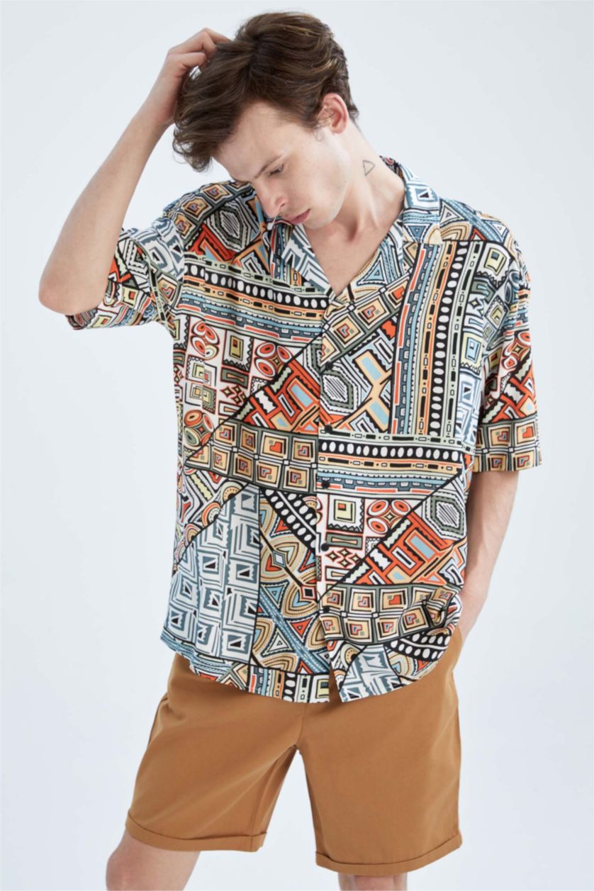 HOMME Orange Chemise oversize à manches courtes en popeline à motifs