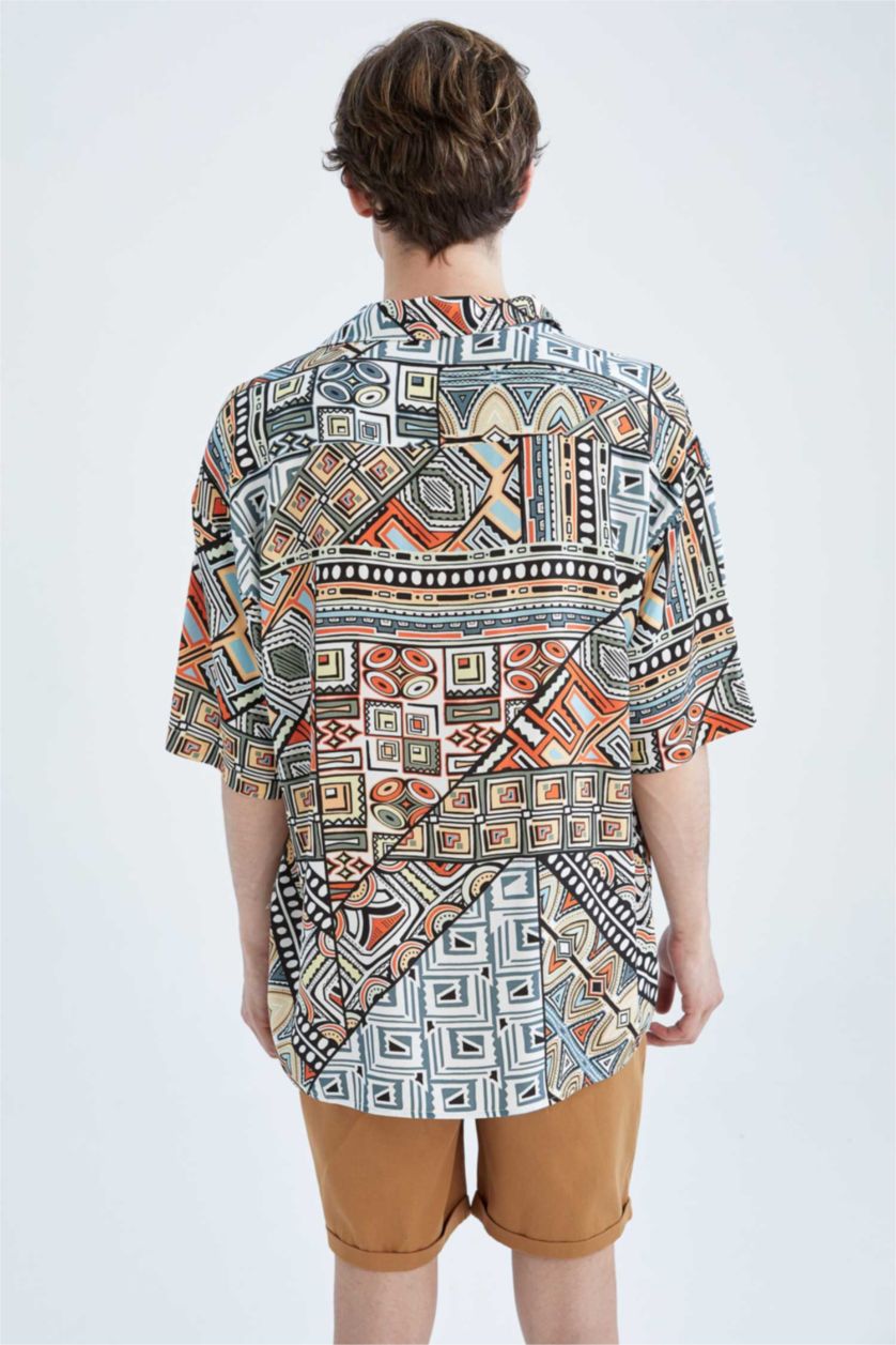 HOMME Orange Chemise oversize à manches courtes en popeline à motifs