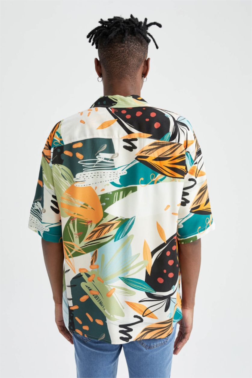 HOMME Orange Chemise à manches courtes en viscose à motifs coupe oversize