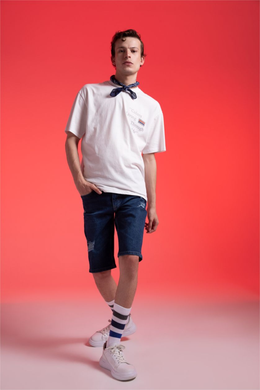 رجال أزرق غامق شورت جينز سليم فيت ممزق