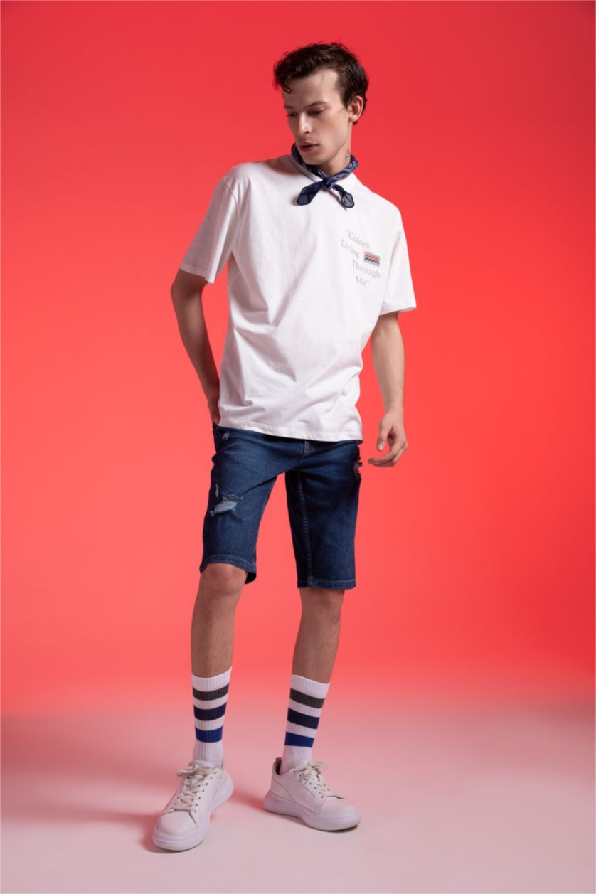 رجال أزرق غامق شورت جينز سليم فيت ممزق