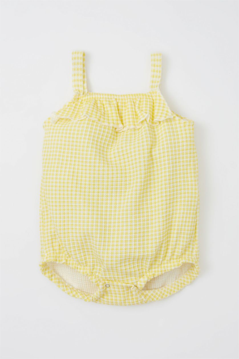 طفلة صغيرة أصفر جمبسوت كاروهات وافل بأزرار كبس