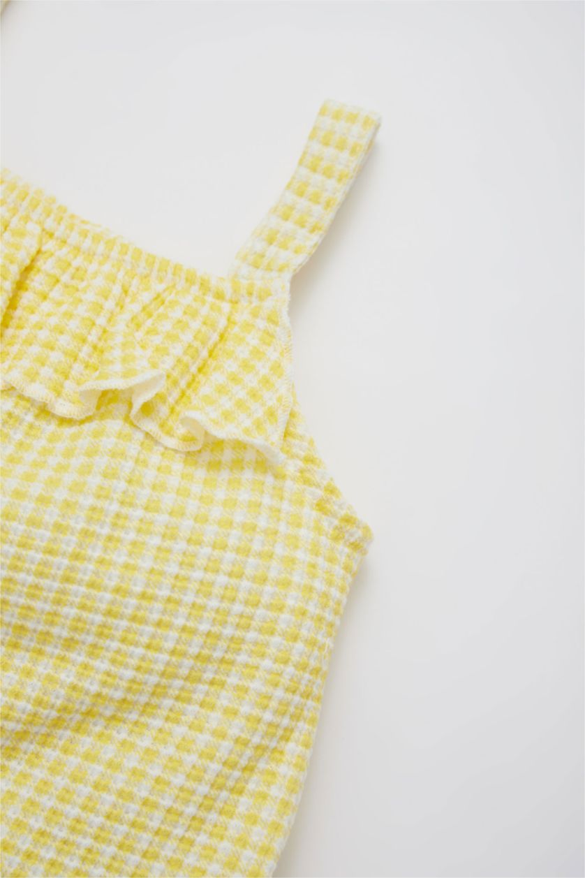 طفلة صغيرة أصفر جمبسوت كاروهات وافل بأزرار كبس