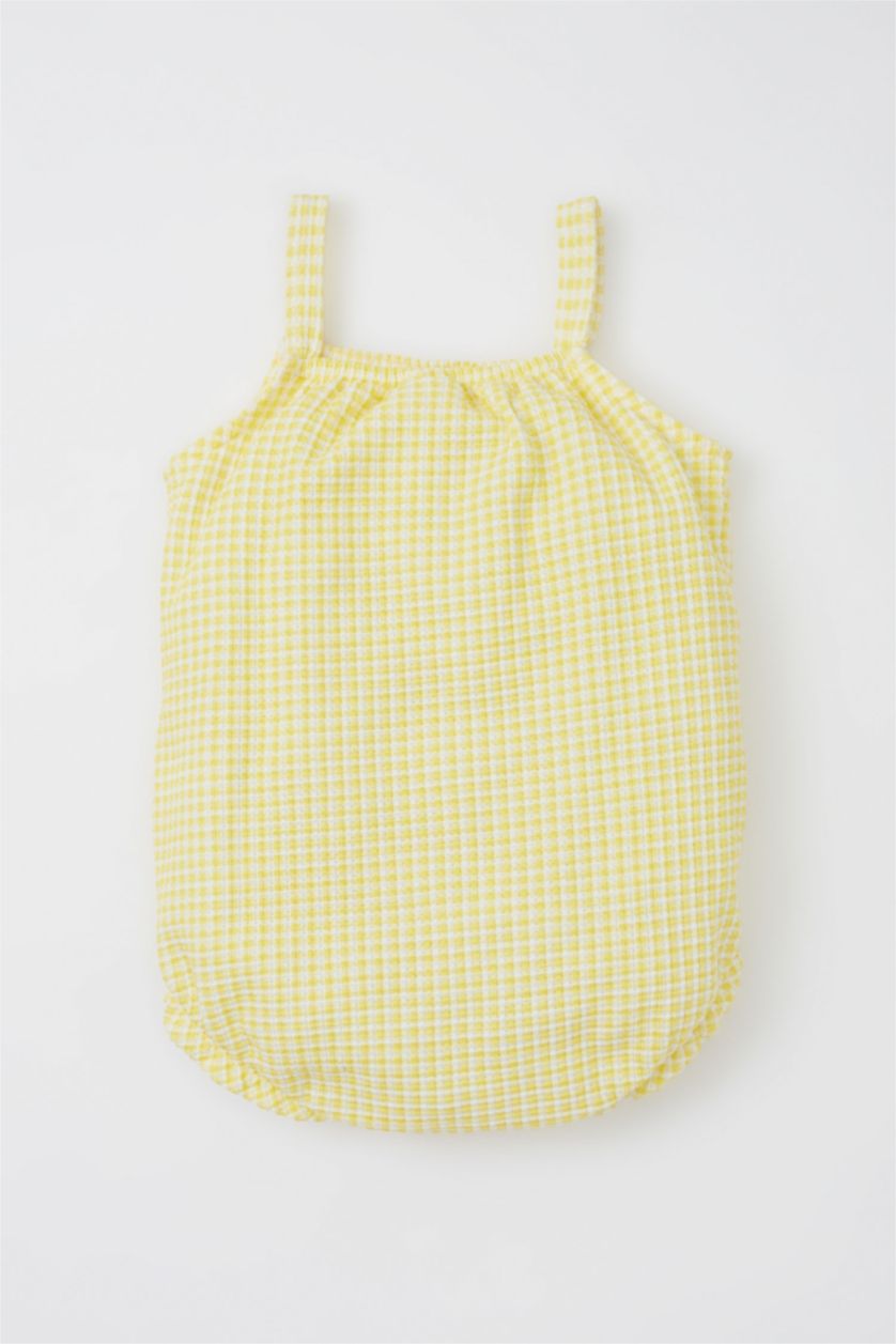 طفلة صغيرة أصفر جمبسوت كاروهات وافل بأزرار كبس