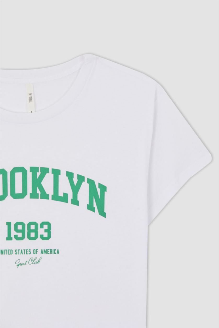 FEMME Blanc T-shirt à manches courtes imprimé à slogan et col ras du cou coupe standard