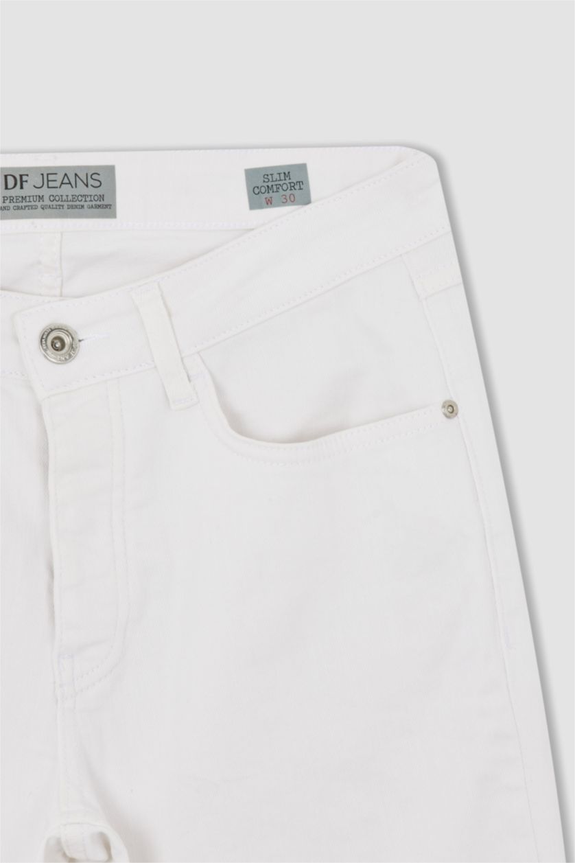 رجال أبيض بنطلون جينز بقصة مريحة ضيقة بخصر عادي بساق ضيق