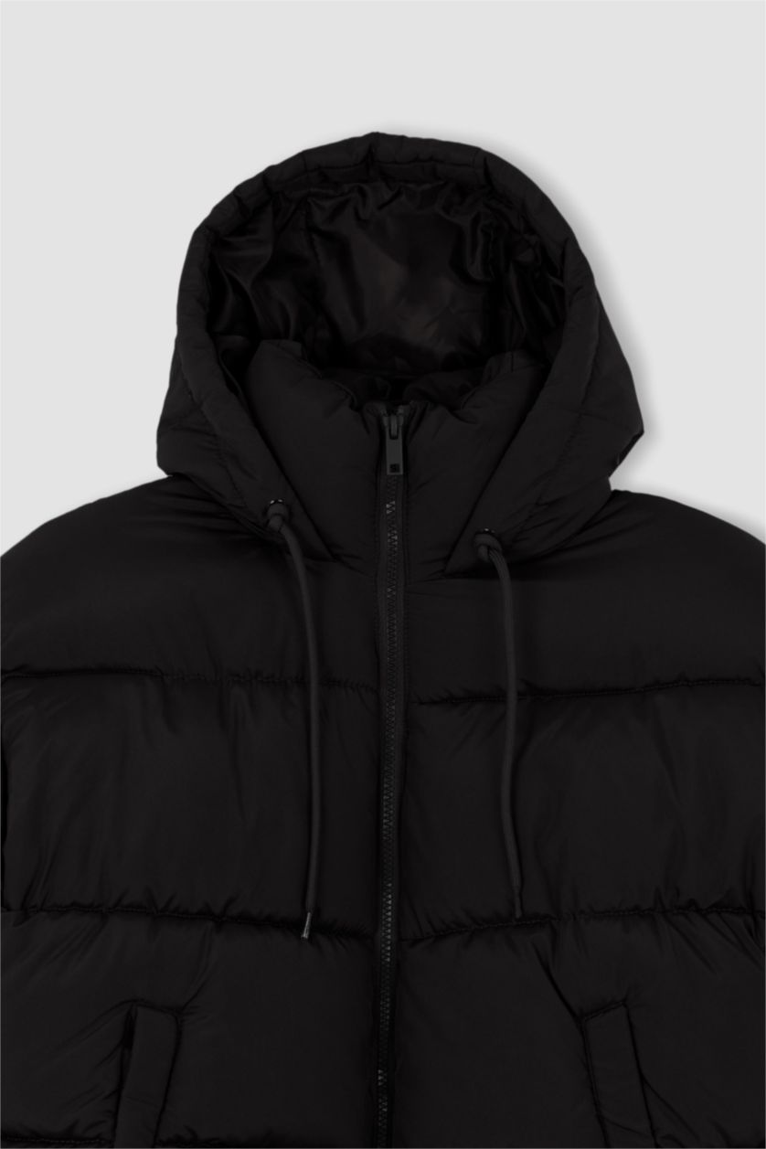 Kadın Siyah Su Geçirmez Kapitoneli Cepli Fermuarlı Kapüşonlu Şişme Mont	