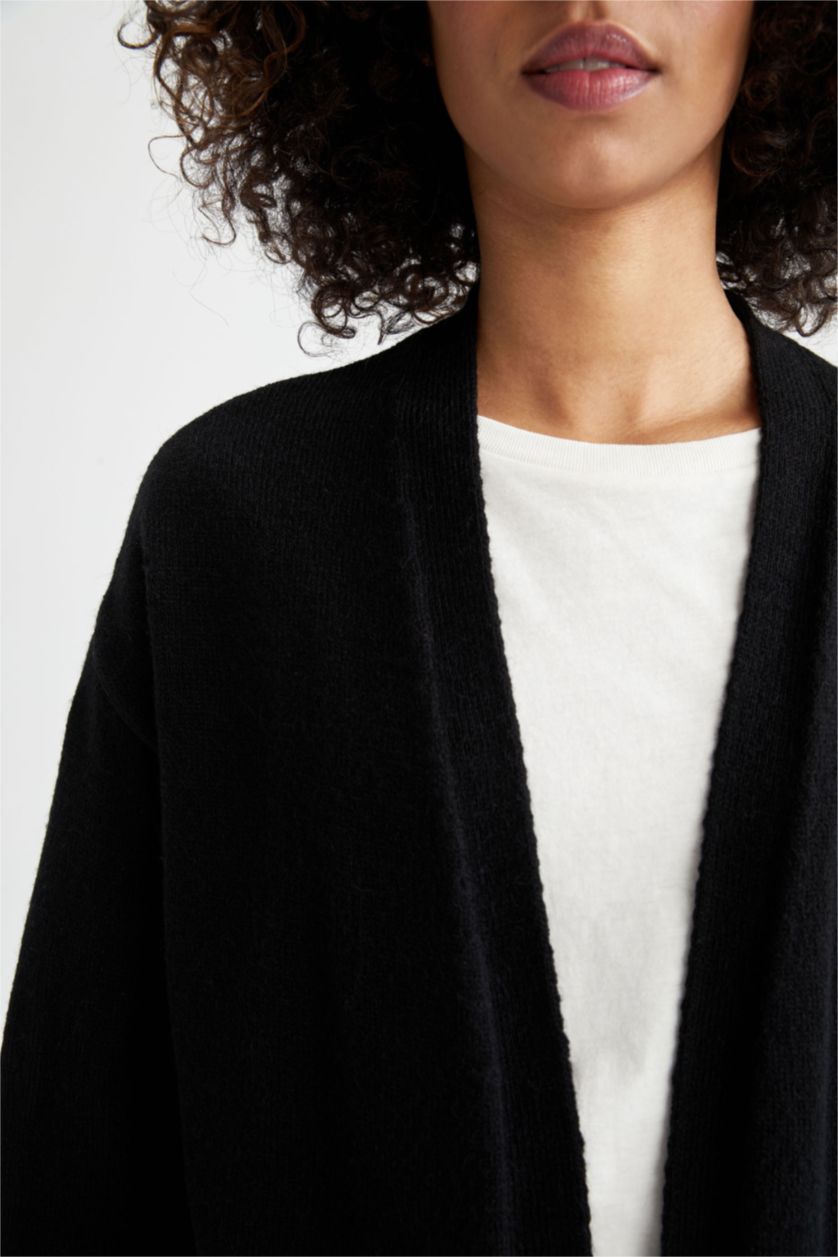FEMME Noir Cardigan mi-long en maille à col en V et poche à coupe régulière