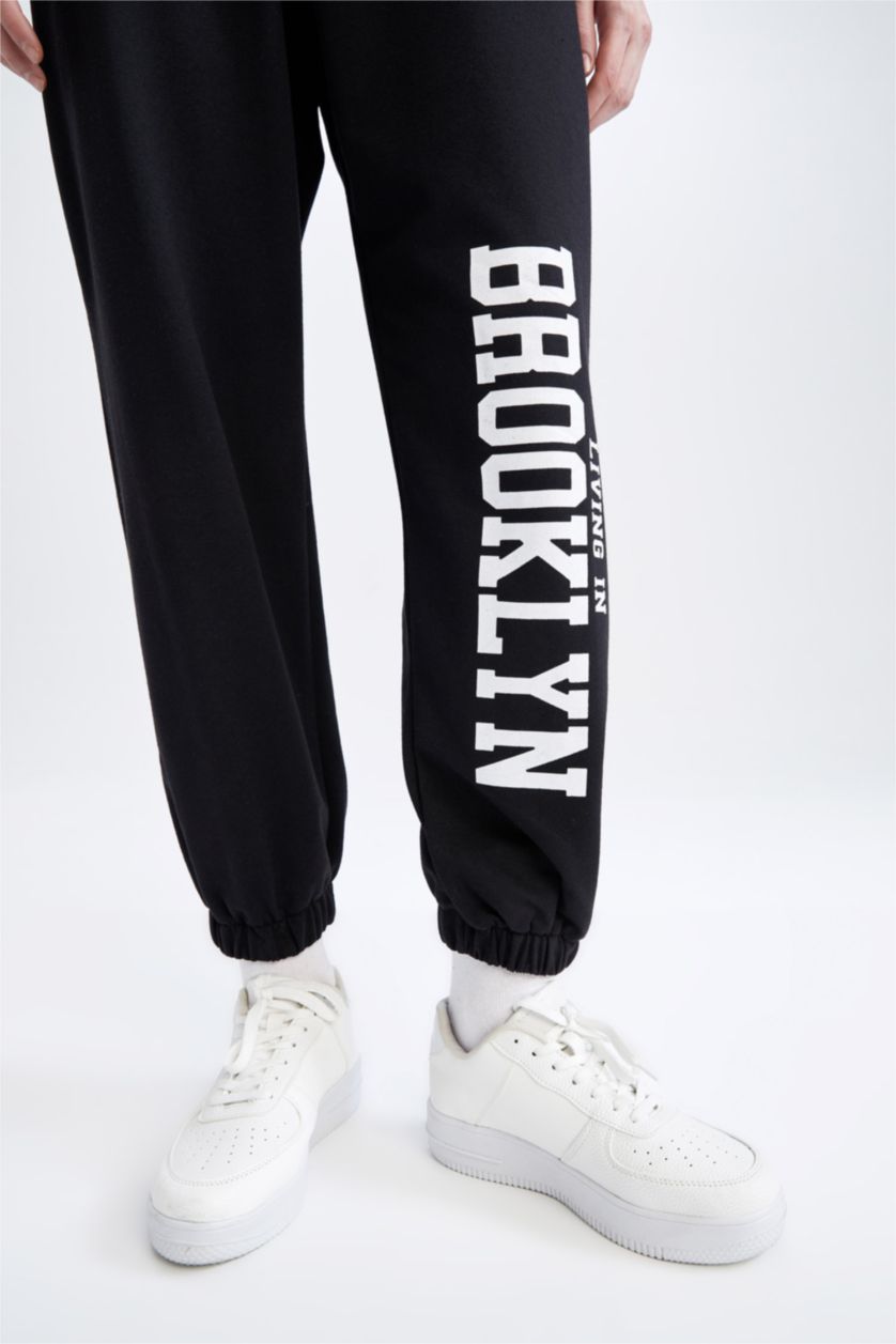 WOMAN Black Oversize Fit Flexible Leg College Printed Thin Sweatshirt Fabric Jogger Sweatpants