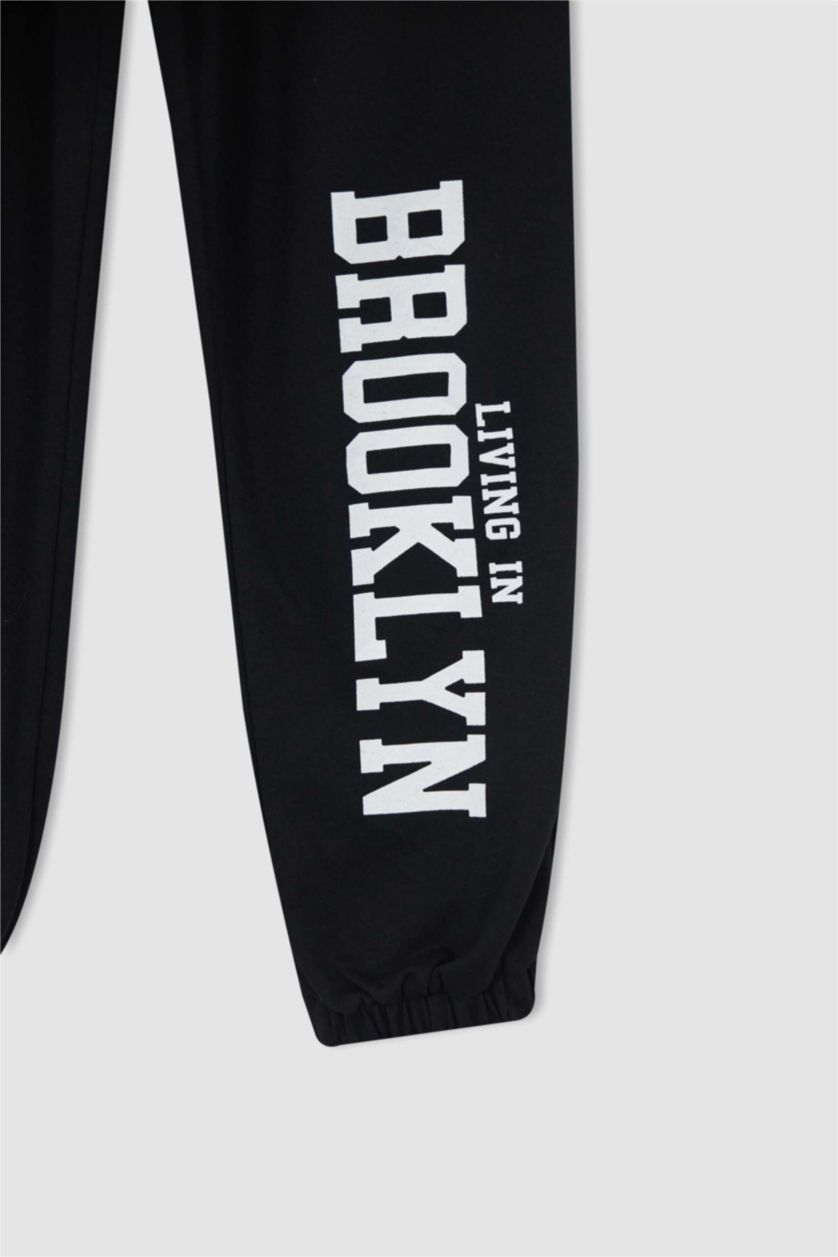 WOMAN Black Oversize Fit Flexible Leg College Printed Thin Sweatshirt Fabric Jogger Sweatpants