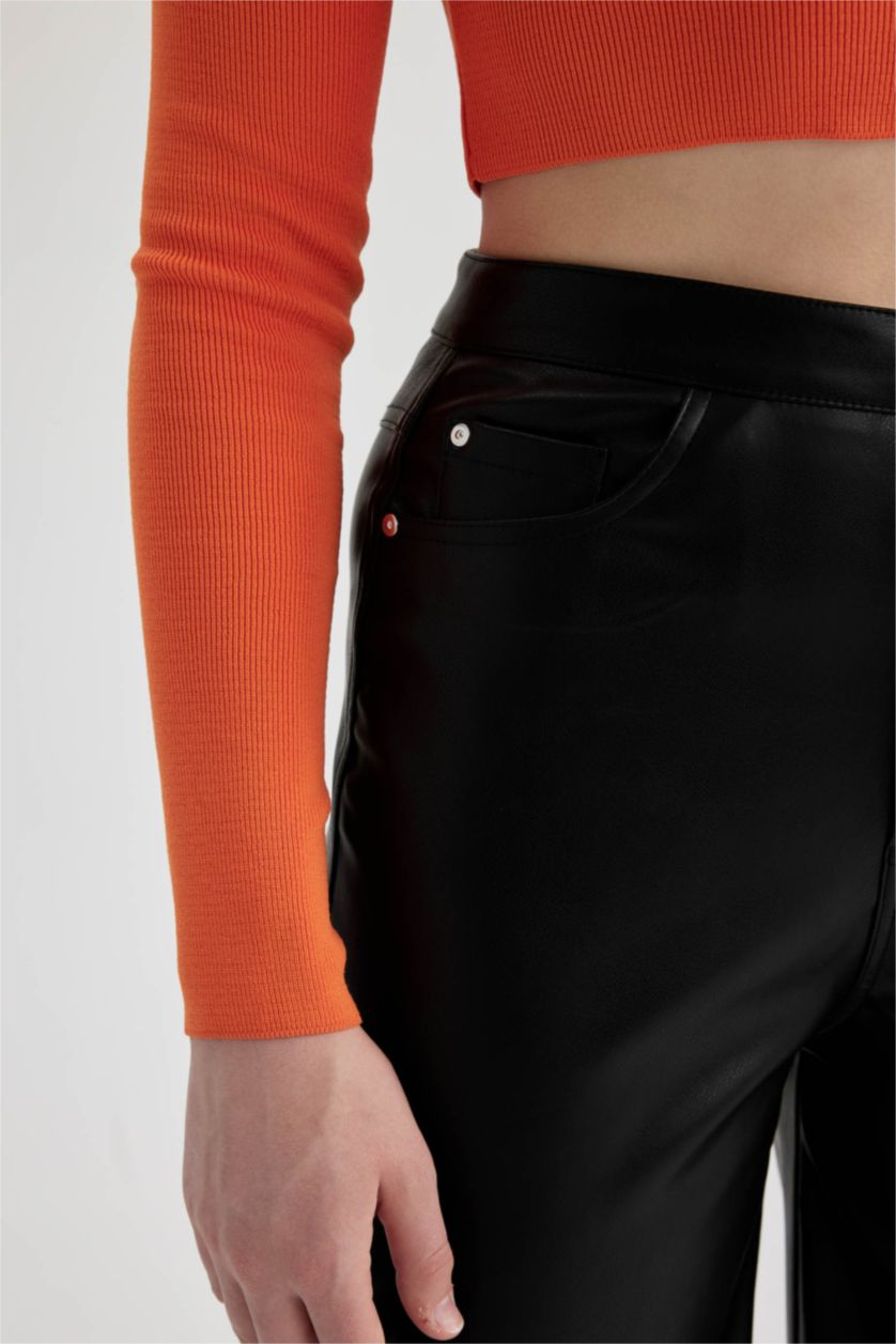 حريمي أسود بنطلون جلد صناعي وايد ليج