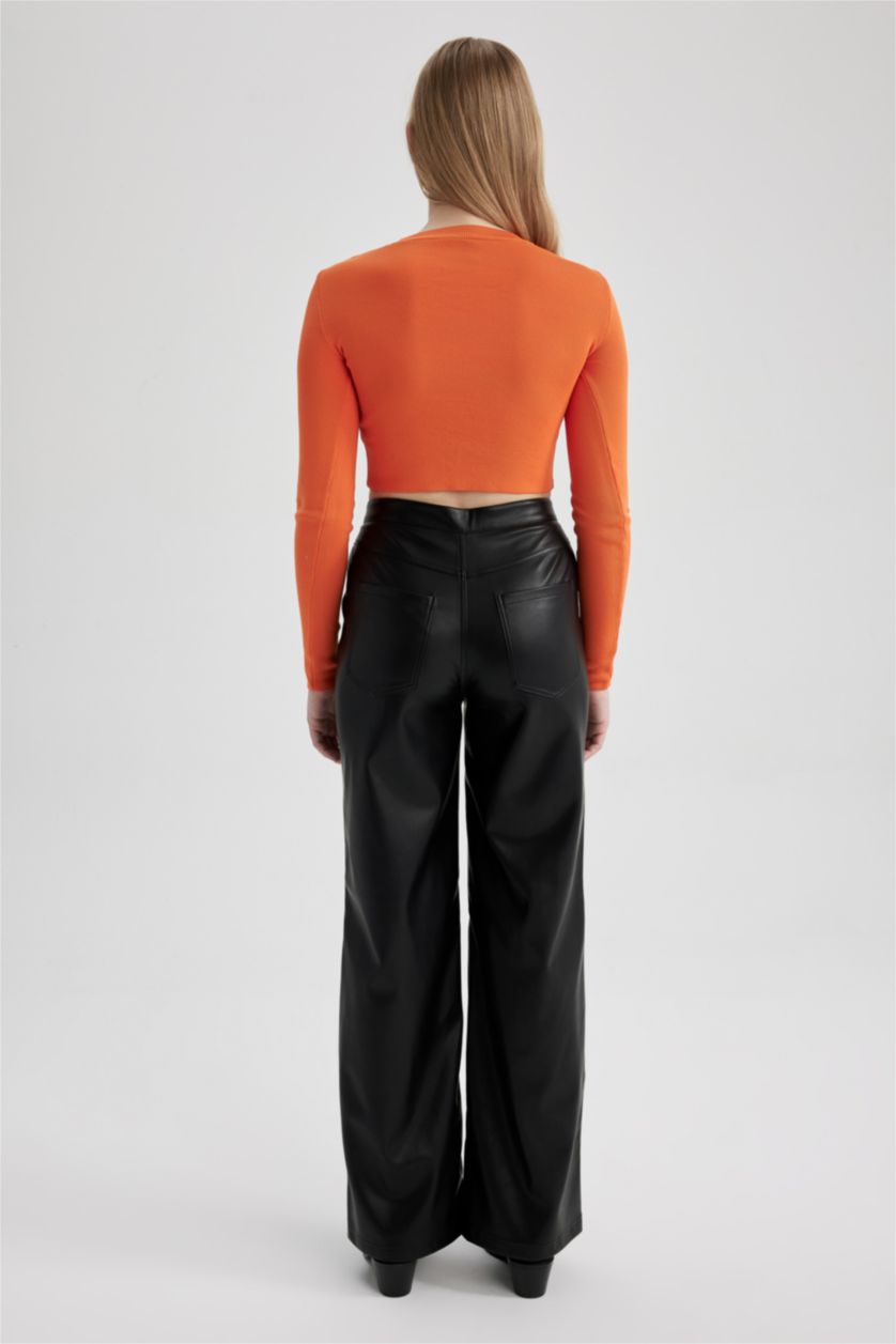 حريمي أسود بنطلون جلد صناعي وايد ليج