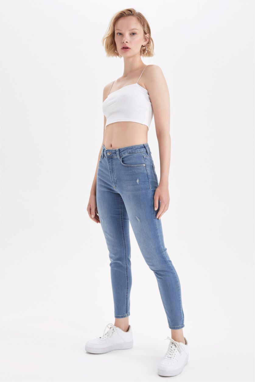 نساء أزرق بنطلون جينز بقصة ضيق للغاية ممزق