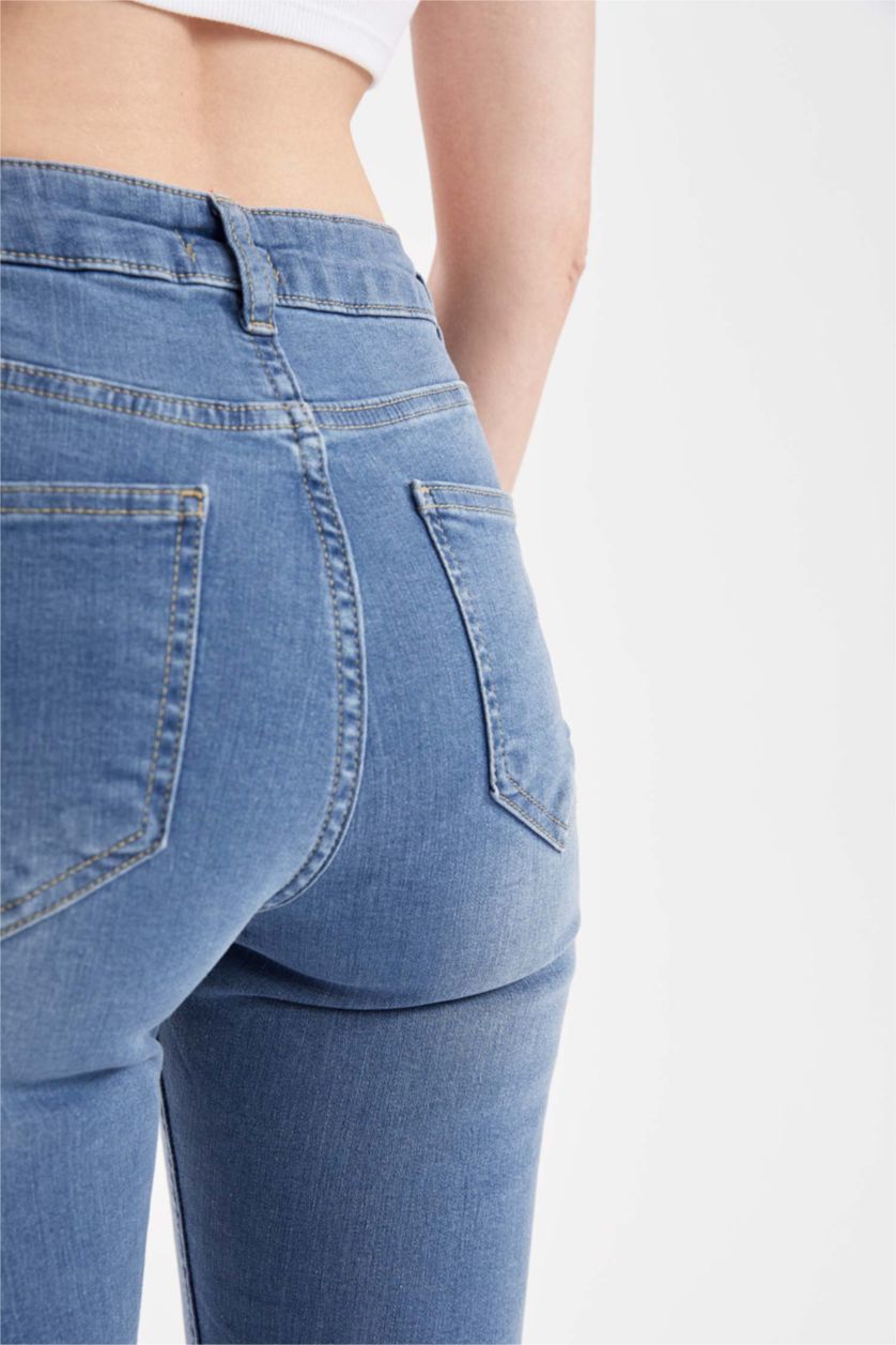 نساء أزرق بنطلون جينز بقصة ضيق للغاية ممزق