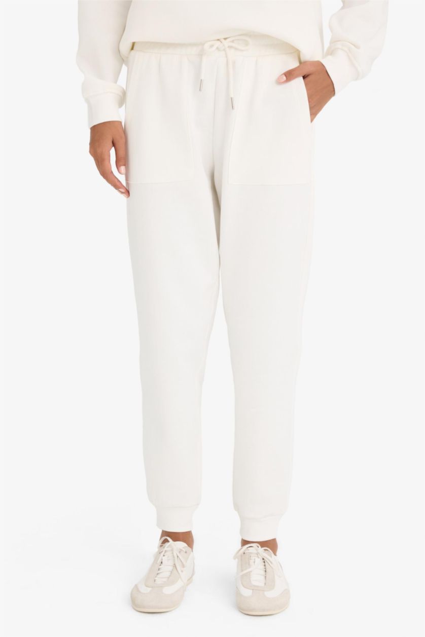 نساء بيج فاتح بنطرون سادة تقيل جوجر فيت بجيب وخصر عالي