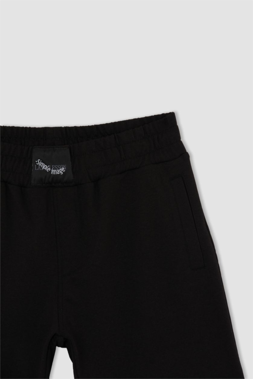 رجال أسود شورت كابري سليم فيت بساق ضيق