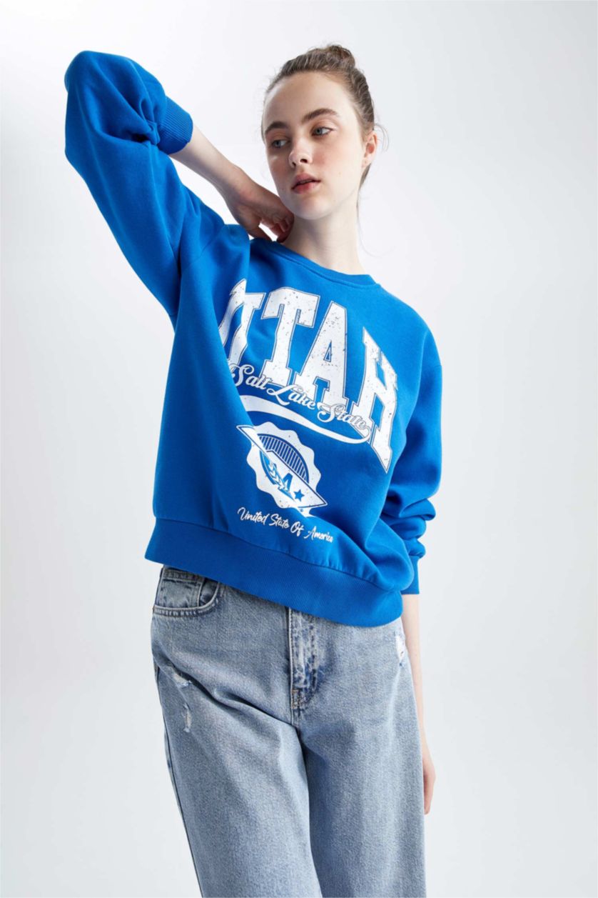 نساء اللون الملكي سويت شيرت قصة عادية بياقة مستديرة