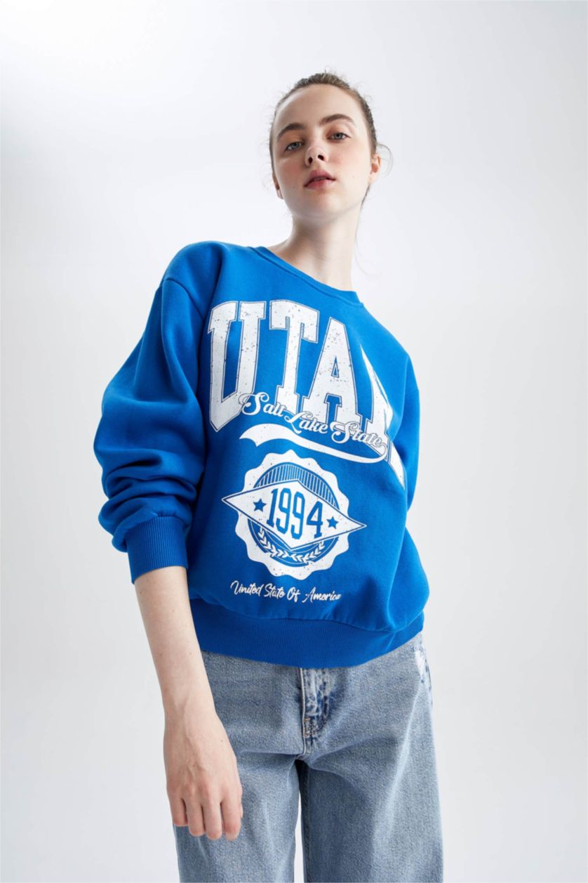 نساء اللون الملكي سويت شيرت قصة عادية بياقة مستديرة