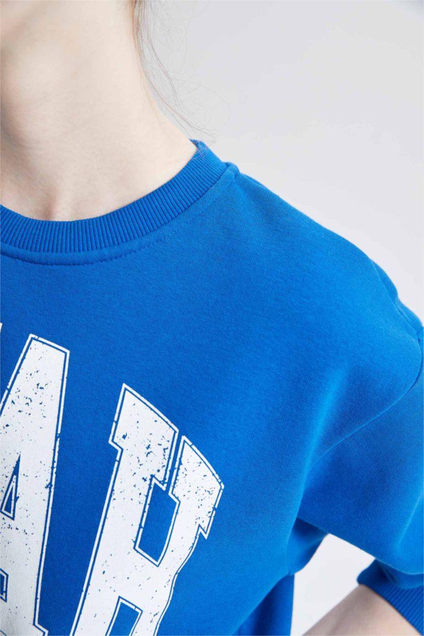 نساء اللون الملكي سويت شيرت قصة عادية بياقة مستديرة