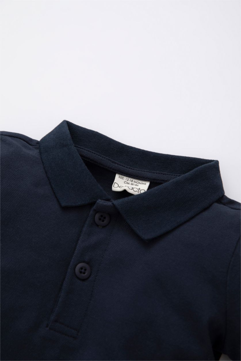 BABY BOY NAVY تيشيرت كم طويل بيكة قصة عادية