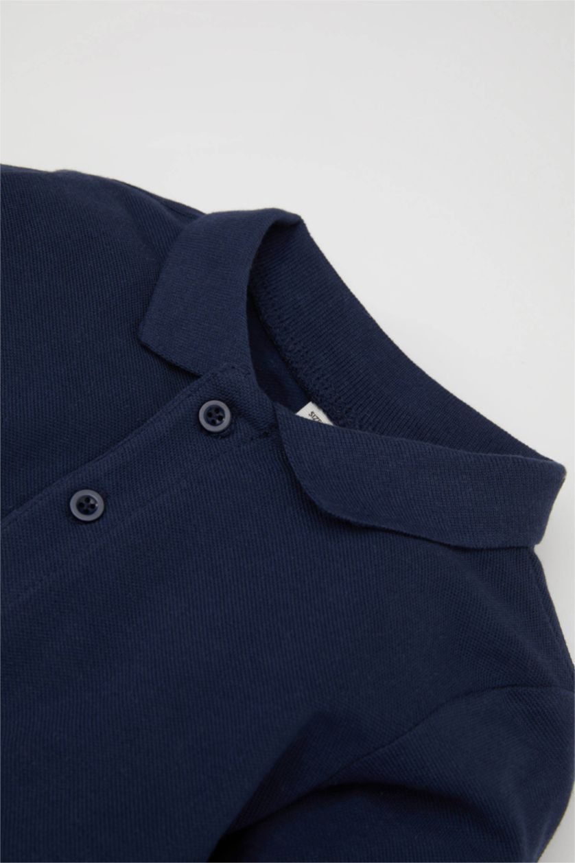 BABY BOY NAVY تيشيرت كم طويل بيكة قصة عادية