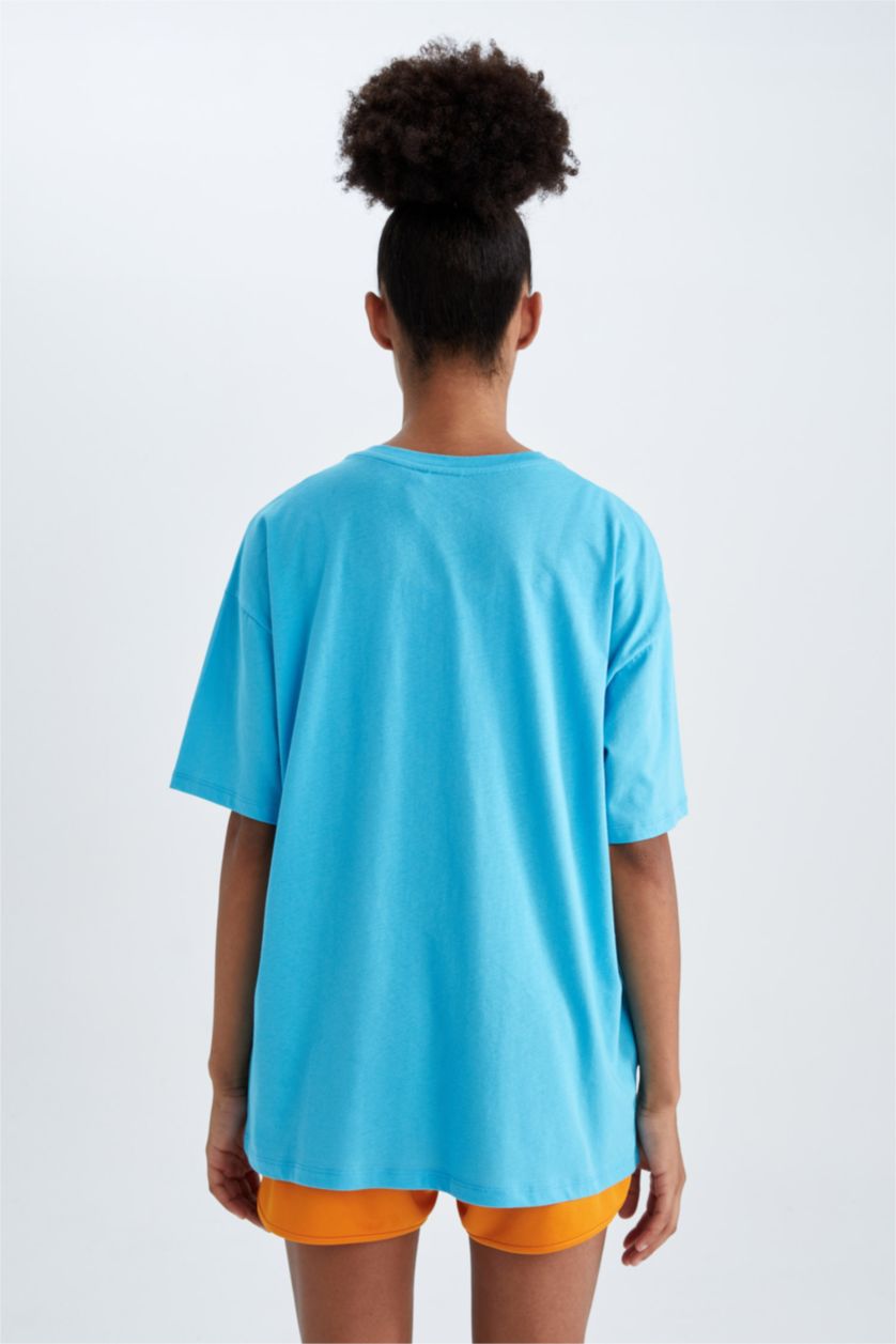 FEMME Turquoise Defacto Fit NBA New York Knicks T-shirt oversize à col rond et manches courtes sous licence