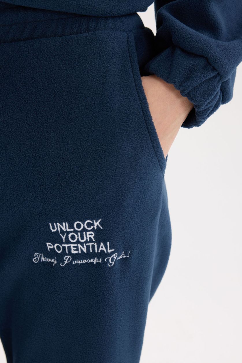 Kadın Lacivert Standart Fit Ayarlanabilir Lastikli Bağcıklı Cepli Baskılı Polar Eşofman Altı