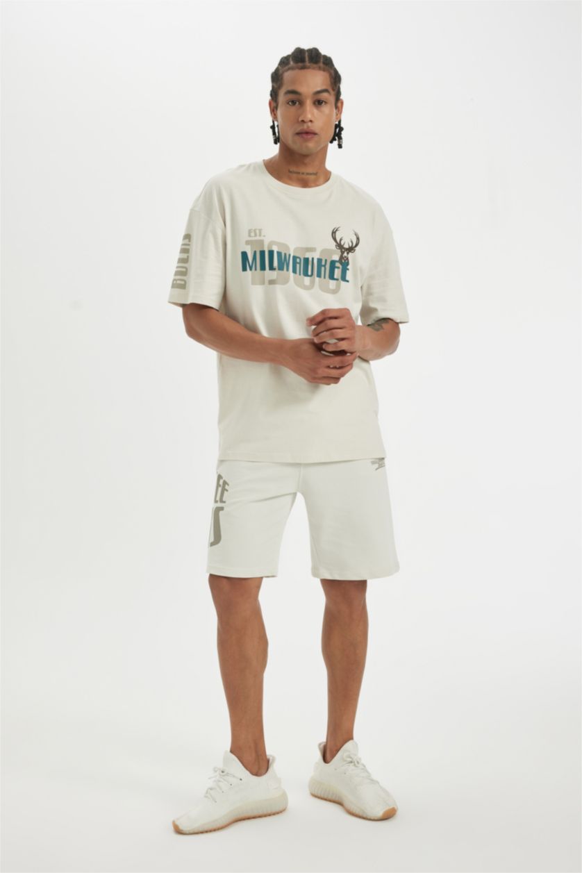 HOMME Beige Defacto Fit NBA Milwaukee Bucks Short à poches coupe régulière sous licence