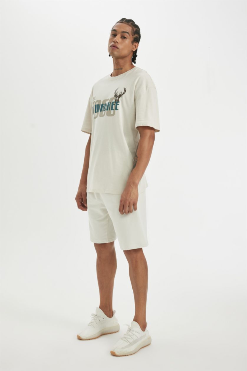 HOMME Beige Defacto Fit NBA Milwaukee Bucks Short à poches coupe régulière sous licence