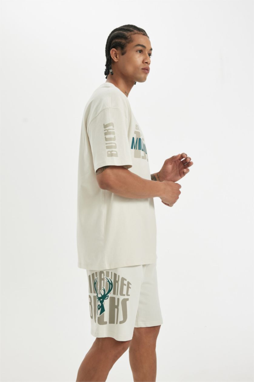 HOMME Beige Defacto Fit NBA Milwaukee Bucks Short à poches coupe régulière sous licence