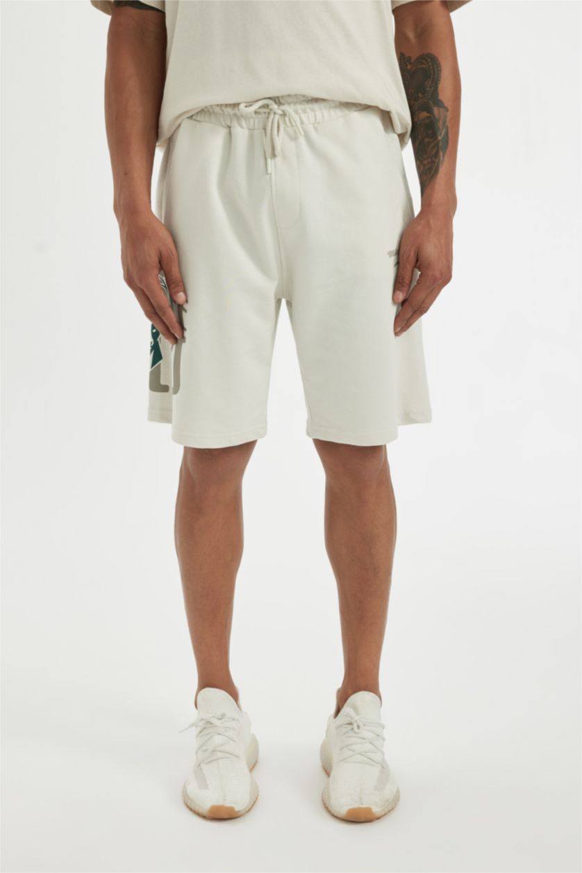 HOMME Beige Defacto Fit NBA Milwaukee Bucks Short à poches coupe régulière sous licence