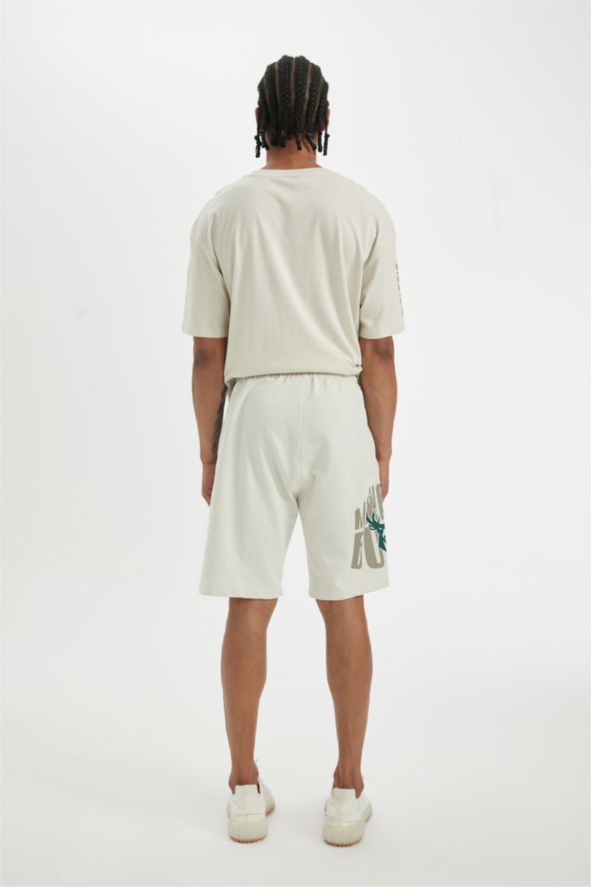HOMME Beige Defacto Fit NBA Milwaukee Bucks Short à poches coupe régulière sous licence