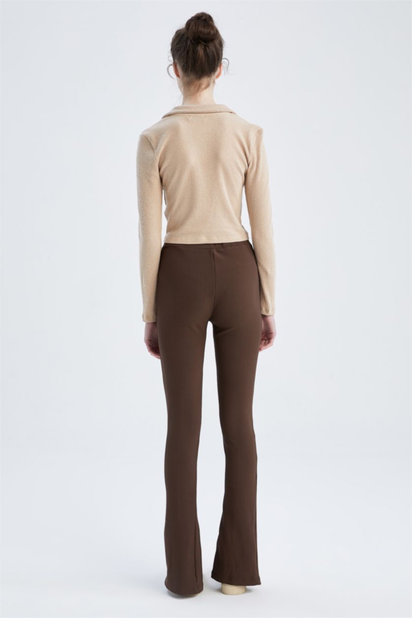 حريمي بني ليجن بخصر عادي طويل