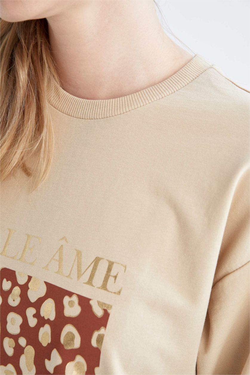 نساء بيج سويت تونيك قماش رقيق مطبوع قصة مريحة بياقة مستديرة