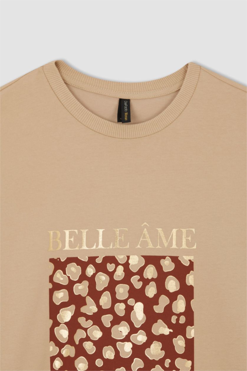 نساء بيج سويت تونيك قماش رقيق مطبوع قصة مريحة بياقة مستديرة