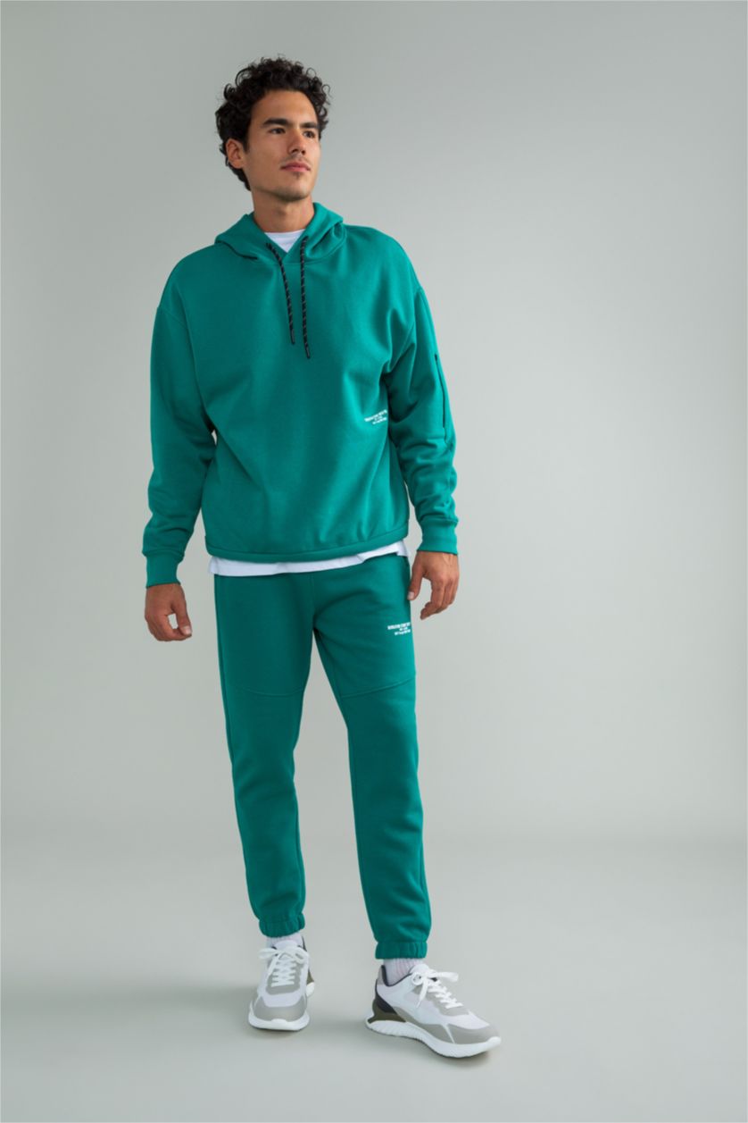 MAN Green Regular Fit Zipper Pocket Trousers