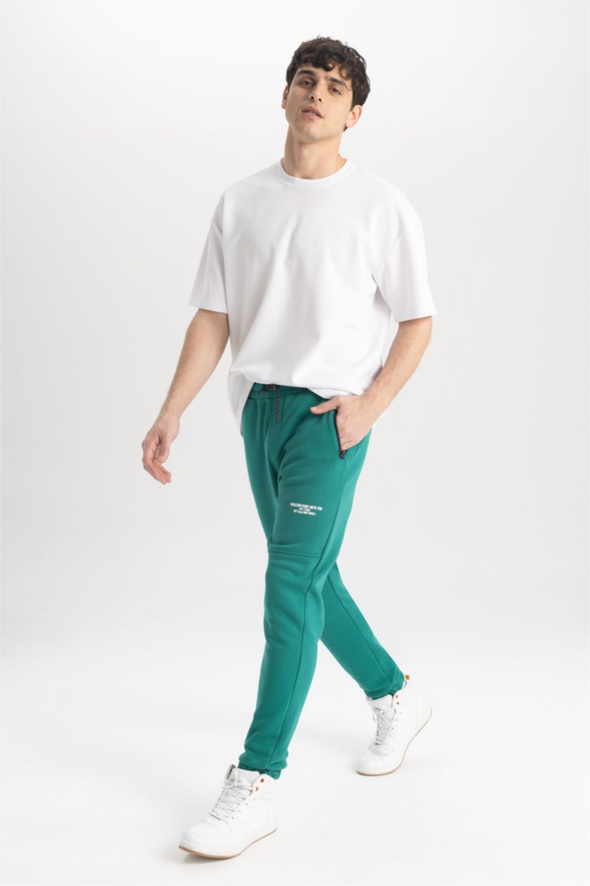 MAN Green Regular Fit Zipper Pocket Trousers