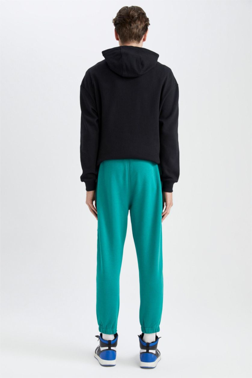 MAN Green Regular Fit Zipper Pocket Trousers