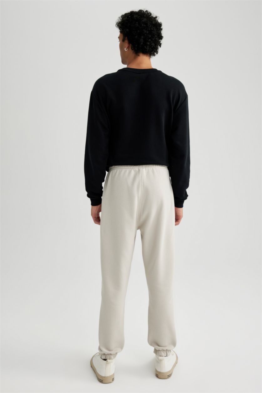 MAN Stone Regular Fit Trousers