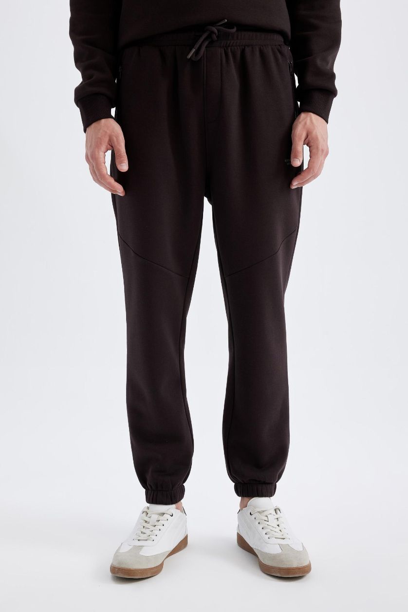 Man Brown Regular Fit Zipper Pocket Printed Trousers